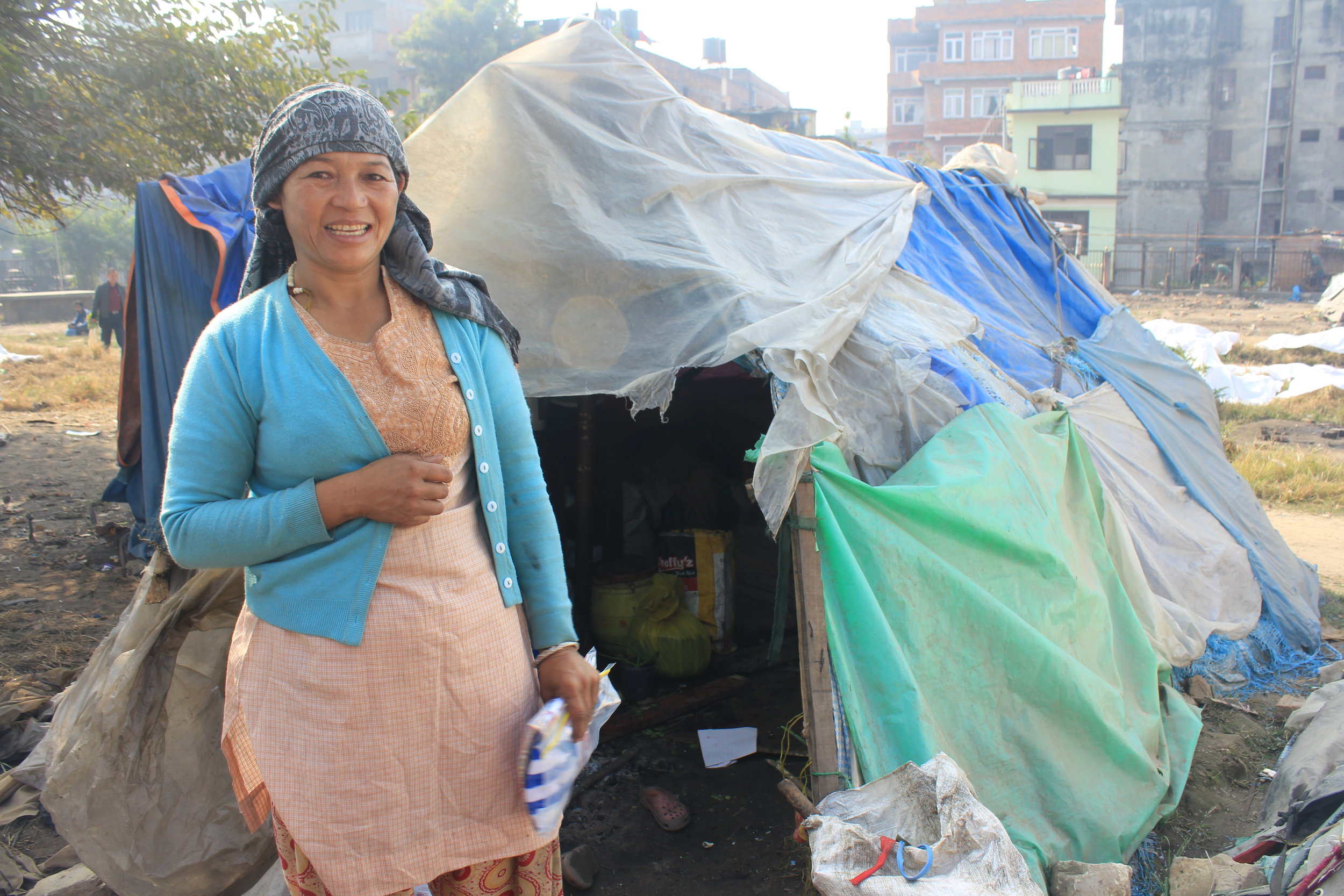 one of the ladies living with her child in a tent city.  Very happy to have recieved some assistance
