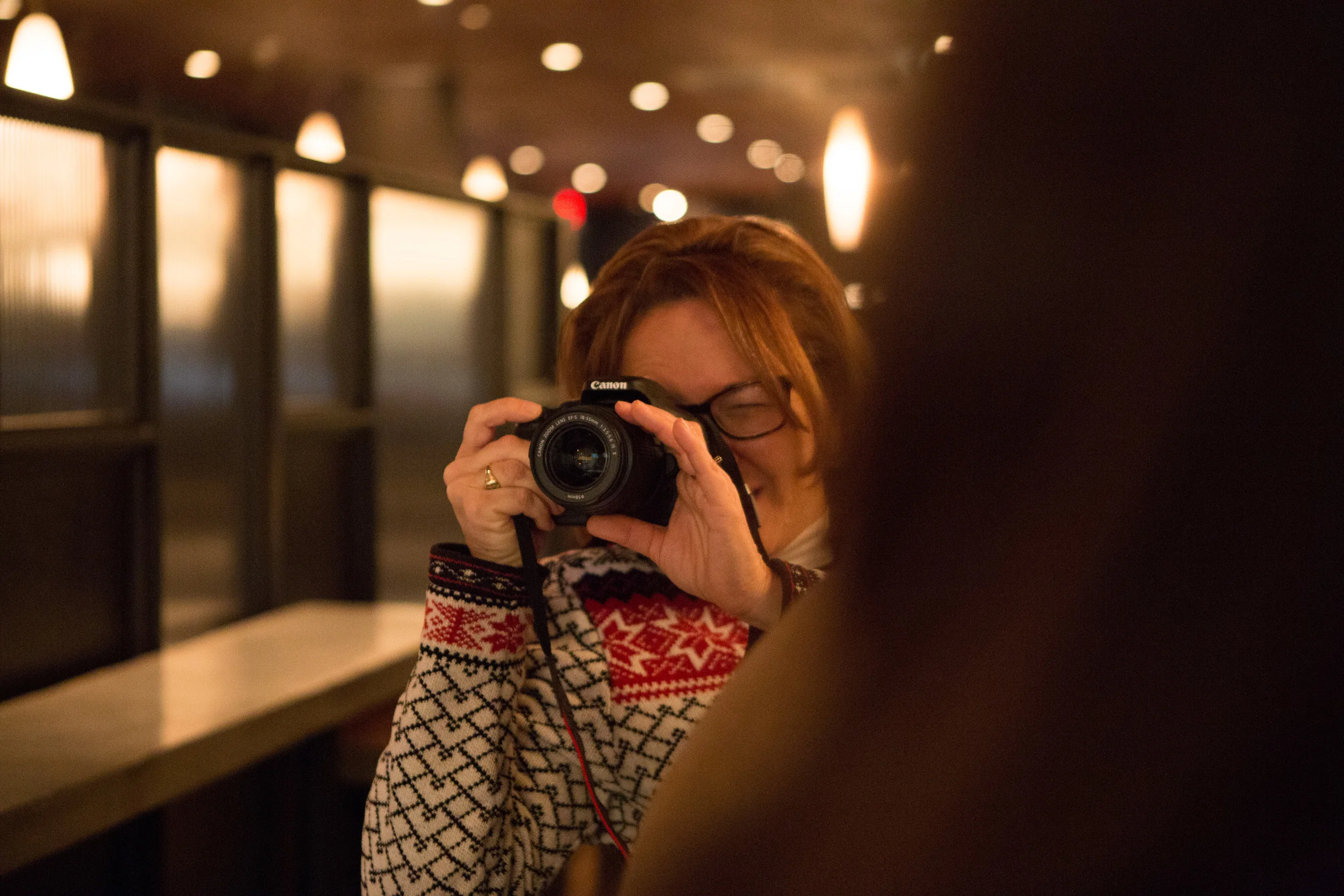Lisa peeking over Rex for a shot.