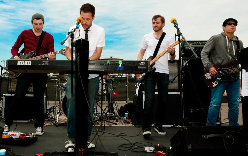  the Calamity is: Owen Bucey — lead vocals, keys Kai Dodson — lead/rhythm guitars, vocals Baltazar Cano — bass Aaron Goldberg — drums, percussion Phil Tibbs -- lead/rhythm guitars the Calamity is an American piano/pop/alternative/country band that was formed in Ventura, CA in 2005 by members of the power pop group Army Of Freshmen (AOF) including: Aaron Goldberg (drums, percussion), Kai Dodson (lead/rhythm guitar, vocals) and Owen Bucey (lead vocals, keys). The origin of the band goes back to an intoxicated night in Cape May, NJ in the practice room of Mr. J's Music Shop while on tour with AOF in the summer of 2004. Baltazar Cano (bass) joined the project in late fall 2008. Phil Tibbs (lead/rhythm guitars) joined the project in late 2010. Various demos and recordings took place between fall 2005 and spring 2008. Notably, a session with Jay Ruston from TRS West studios in Studio City, CA with the result of 2 tracks (One Of These Days/Waiting For July) off the upcoming debut release, “Songs From The Gold Coast.” The debut album, “Songs From The Gold Coast,” out on Missing Words Records July 28th, 2009, was written by the Calamity and produced by the Calamity, Jay Ruston and Paul Miner. It was recorded in two sessions. Spring of 2006 with Ruston @ TRS West studios in Studio City, CA; and winter of 2008 with Miner @ Buzzbomb Sound Labs in Orange, CA. All photography for “Songs From The Gold Coast” was done by Baltazar Cano. Layout and design courtesy Matt Martin (www.blasterbolts.com). Track listing is as follows: 1 Waiting For July 2 Yesterday's Tragedy 3 Whiskey Sour 4 Wrapped Up (In The Melody) 5 Asphalt 6 Walk Down 7 Island 8 Diane 9 One Of These Days 10 .45 11 Take Some Time Songs From The Gold Coast is a collection of melodic piano pop songs with a dash of country flare and a touch of bitterness. Dry 7" recorded in Ventura in late 2010. For fans of: Counting Crows, Ben Folds, Old 97’s, Maroon 5, Something Corporate Discography Dry - 7" Vinyl Released 2011 Side A: Dry Side B: We Descend Hand-numbered limited edition of 300, the first 100 pressed on blue vinyl and 200 on marble vinyl. Includes digital download. Songs from the Gold Coast - CD Released 2009 1. Waiting for July 2. Yesterday's Tragedy 3. Whiskey Sour 4. Wrapped Up (in the Melody) 5. Asphalt 6. Walk Down 7. Island 8. Diane 9. One of these Days 10. 45 11. Take Some Time Official Website http://www.thecalamity.com 