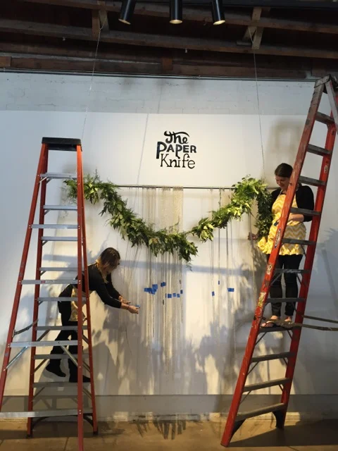 Hanging the steel ball chain curtain. 