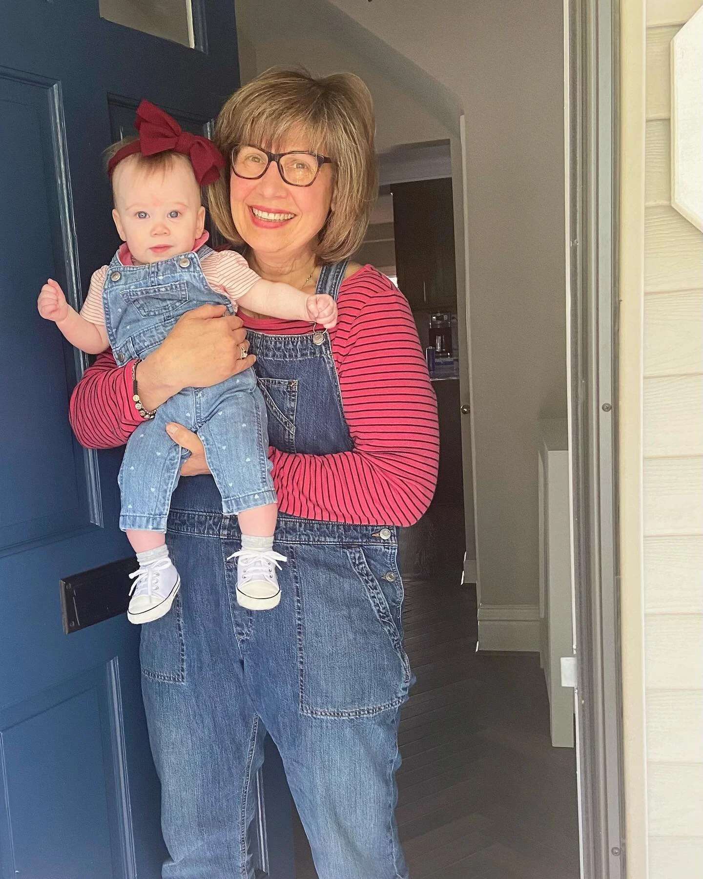 Mom appreciation cont&rsquo;d! Grandy came to town with a paintbrush: turned our brown door blue, and covered Colette in denim hugs / lipstick kisses / dirty martini 🍸😉 

New house feeling more like home with your magic, maternal touch @maredoman ?