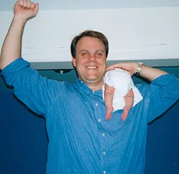 Dave Kirchhoff (and tiny, tiny, tiny daughter Harley) in c1998: weighing in at an intimidating 245 pounds