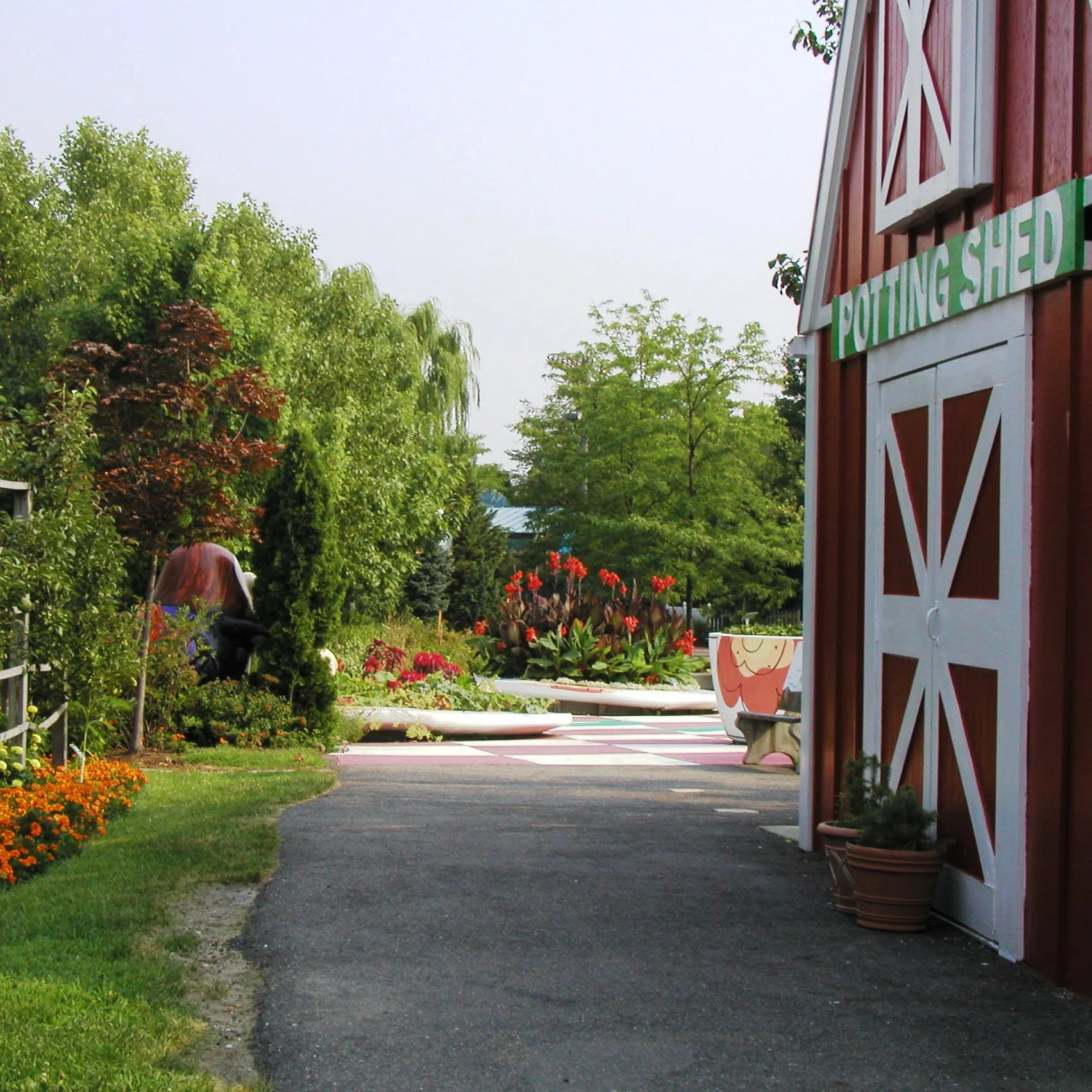 Enter the Potting Shed to learn all about food. Inside you will find the exhibit, Food: From Farm to Family. Parents relax on a bench while children play in one of three areas in including the farm, the farm market, and the family kitchen.