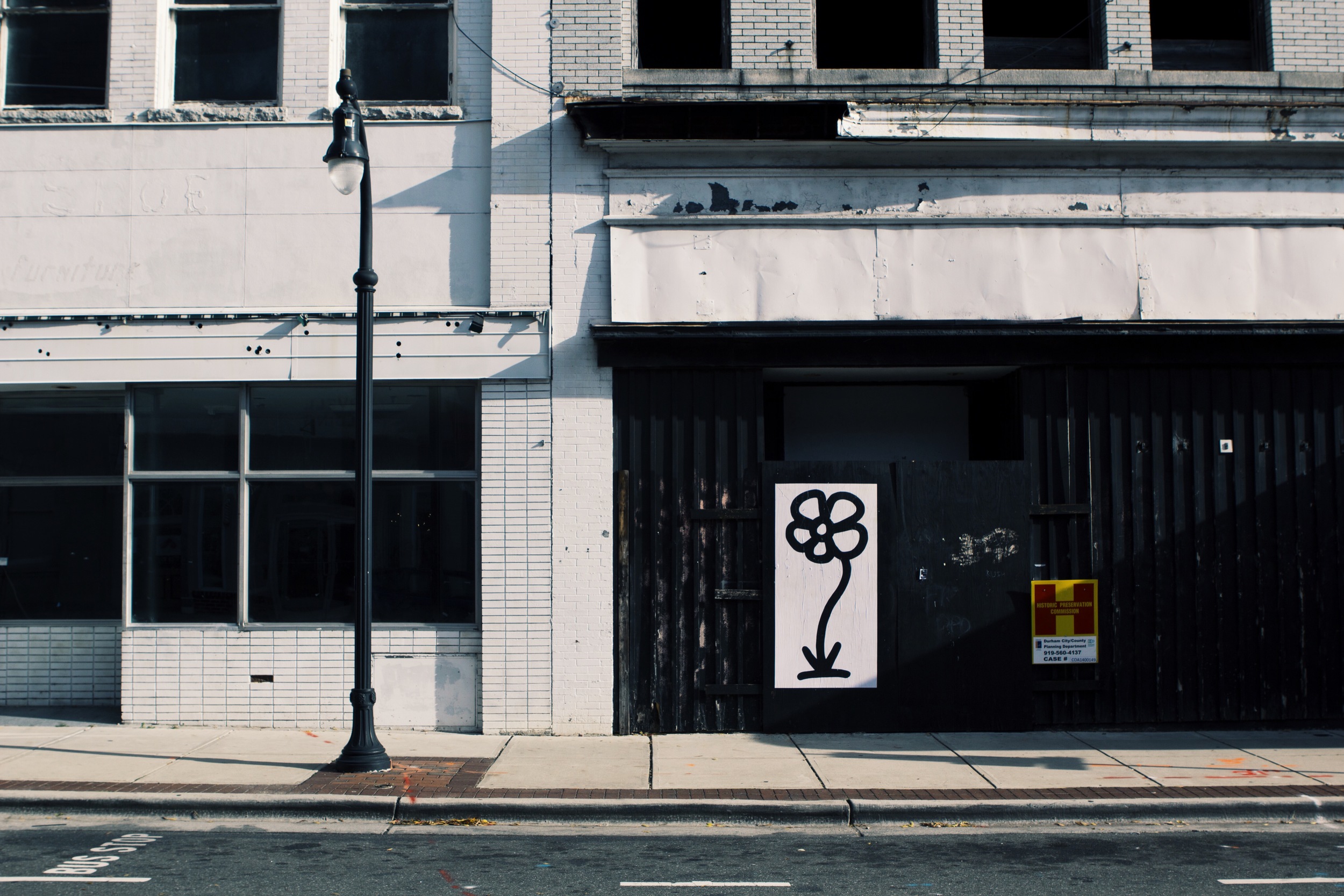 City Center District bloom on historic Parrish Street facade, downtown Durham