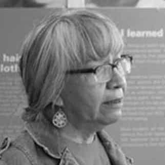 a black and white photo of Barb Blind