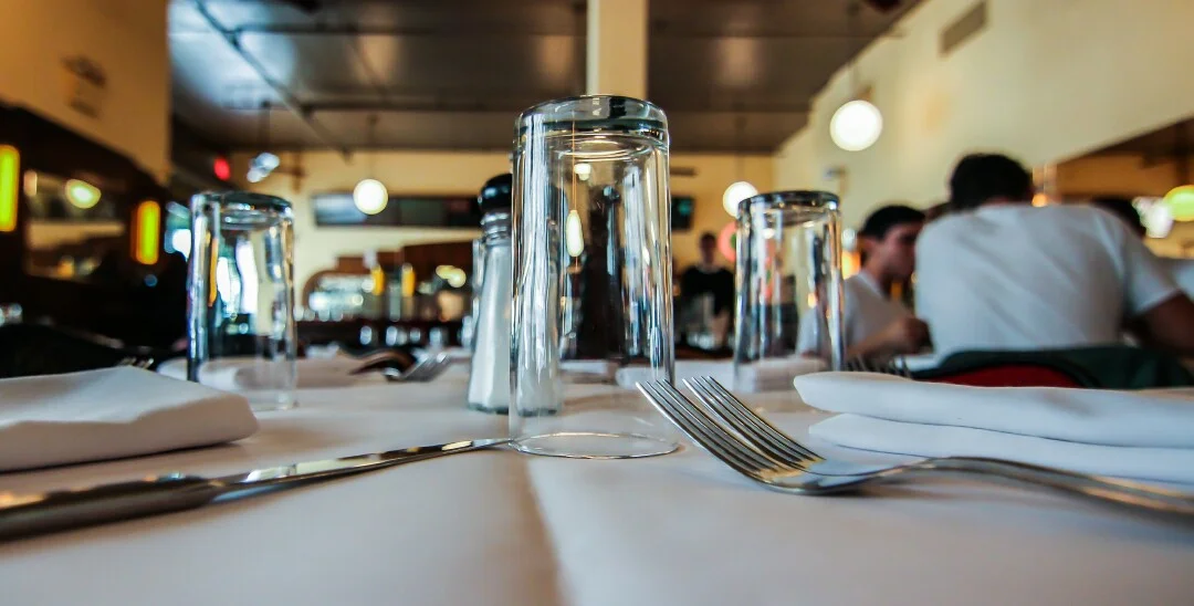 A Beacon November 8, 2013 The Odeon, a beacon for Manhattan night crawlers since the early 1980's, may be the most consistent restaurant ever to put down roots south of 14th Street. It has always delivered solid bistro cuisine in an attitude-free atmosphere, even when it was the very definition of hip. It makes a strong first impression when the waiter greets diners with a hunk of chewy, rustic French bread and a small dish of black olives seasoned with lemon and lime zest. The menu is simple, with appetizers like a classic American shrimp cocktail rubbing shoulders with frisee aux lardons and onion soup. You expect to find a hangar steak with french fries, and there it is, along with trout amandine and a somewhat unusual grilled pork tenderloin with broccoli rabe, faro and bourbon sauce. Desserts run to homey American classics, like chocolate pudding, or bistro standbys like profiteroles. It may well be that in its 20 years of existence, the Odeon has never served a bad meal, and that's saying something. by William Grimes