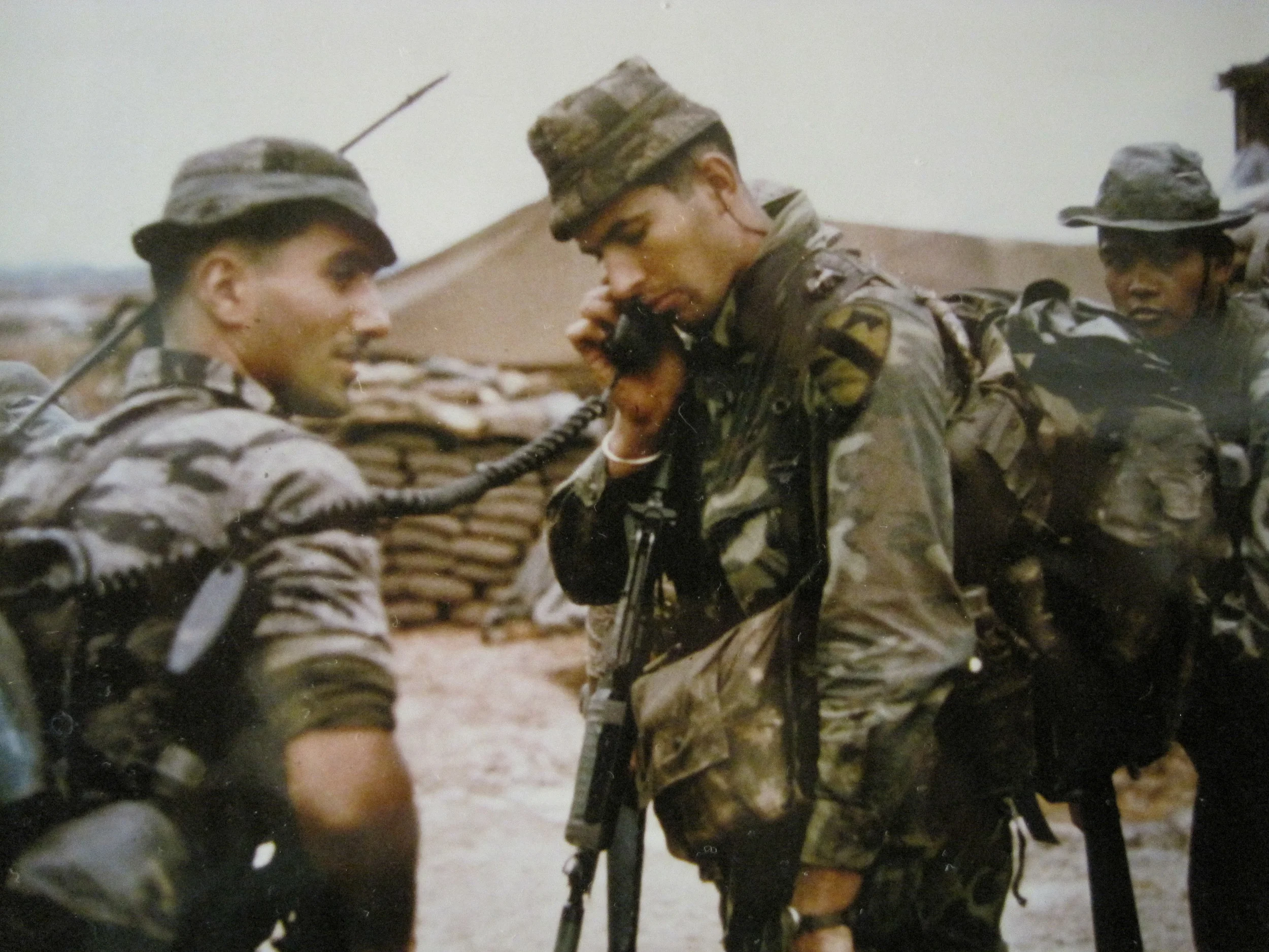 Sgt. Parkinson, Cpl. Puk, and me on left