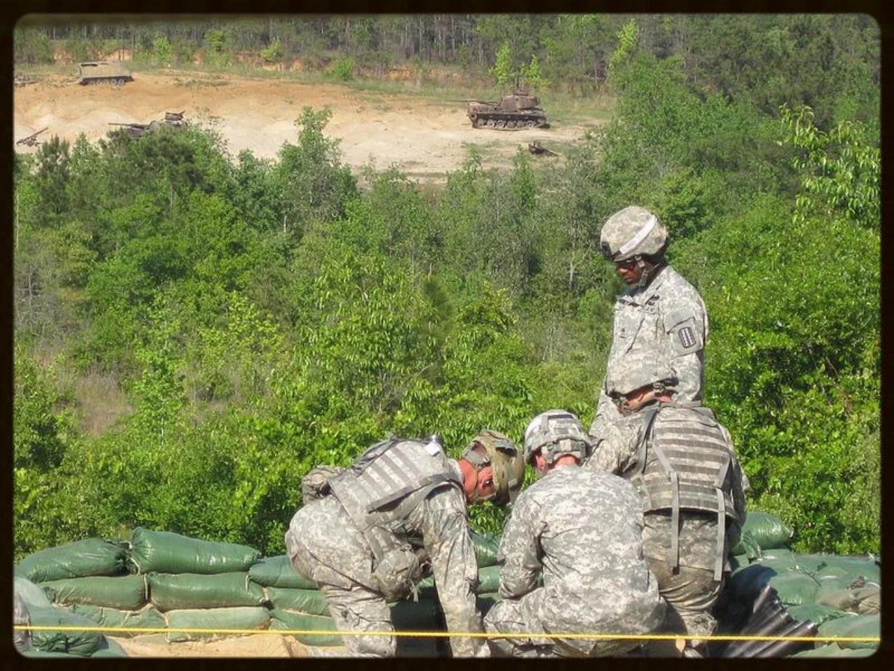 Friday, April 13, 2012. Rangers firing high explosive shells from handheld 60mm M224 mortars. Best Ranger Competition, Fort Benning, Georgia.