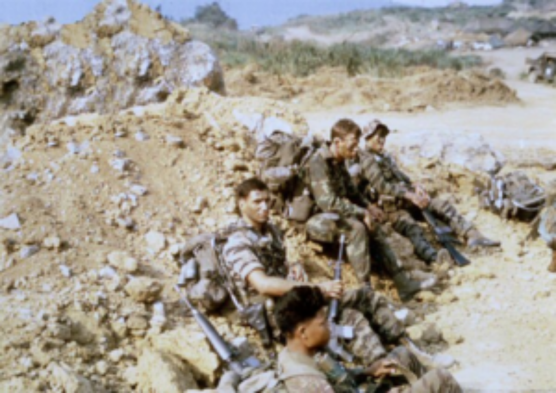 Sunday, April 7, 1968. LZ Stud, waiting our insertion. Cpl. Dish, me, Bruce Cain, and Bob Whitten (rear)