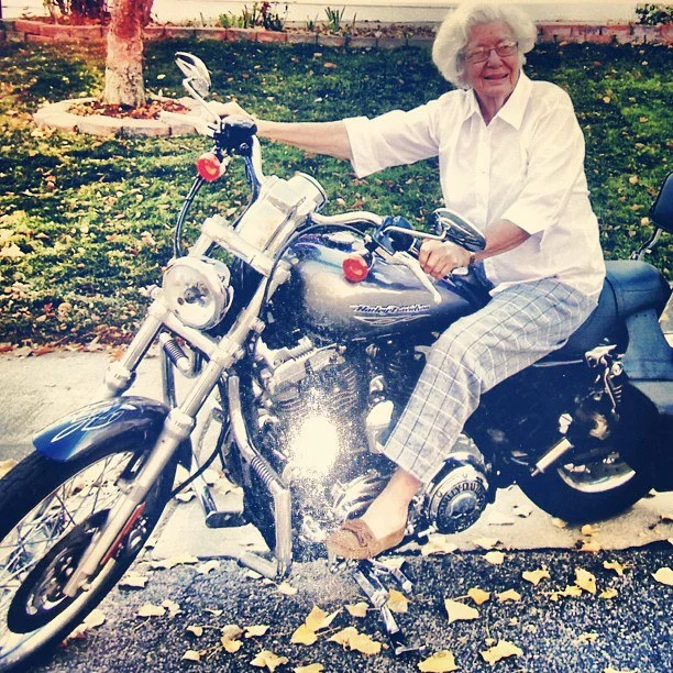 Gran Fran sitting on a Harley motorcycle on her 2013 Christmas card