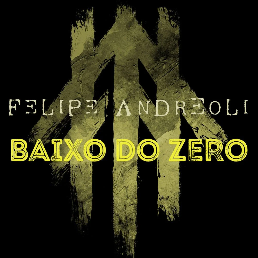 Capa de livro com fundo preto, uma grande cruz estilizada amarelada no centro, com o título "Baixo do Zero" em letras amarelas e o nome do autor Felix Andreoli em letras brancas.