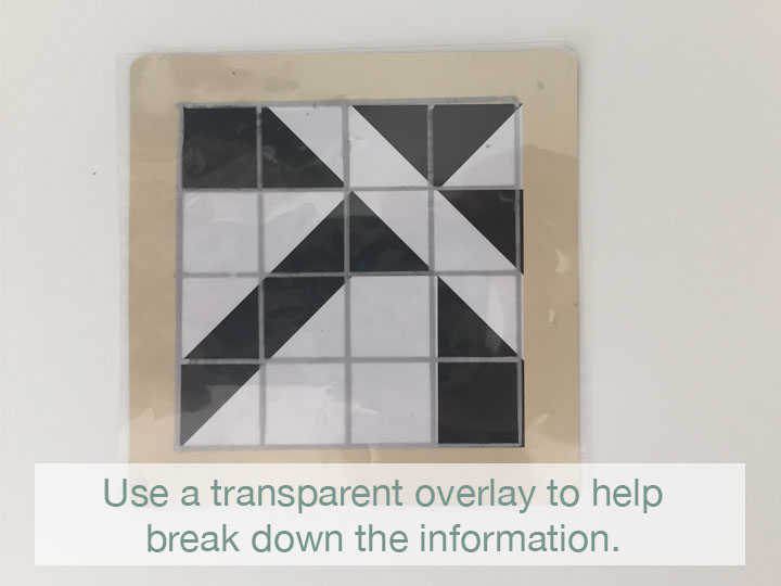 As a quick device to help visualize what the whole would look like as its parts, I drew a grid to scale with metallic sharpie on a piece of a transparency. This is something that can be held over the card during the whole project, or just used as needed for reference until they are comfortable visualizing where the blocks will end. 