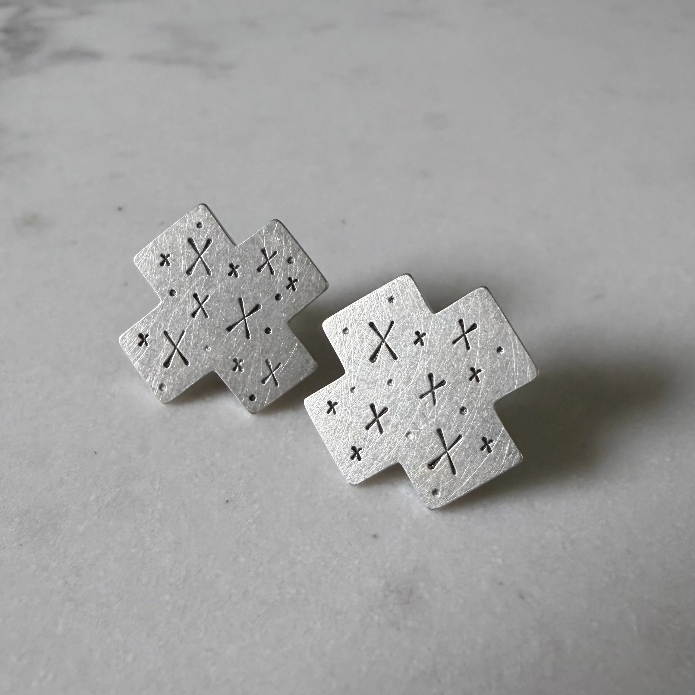Stamped X Studs