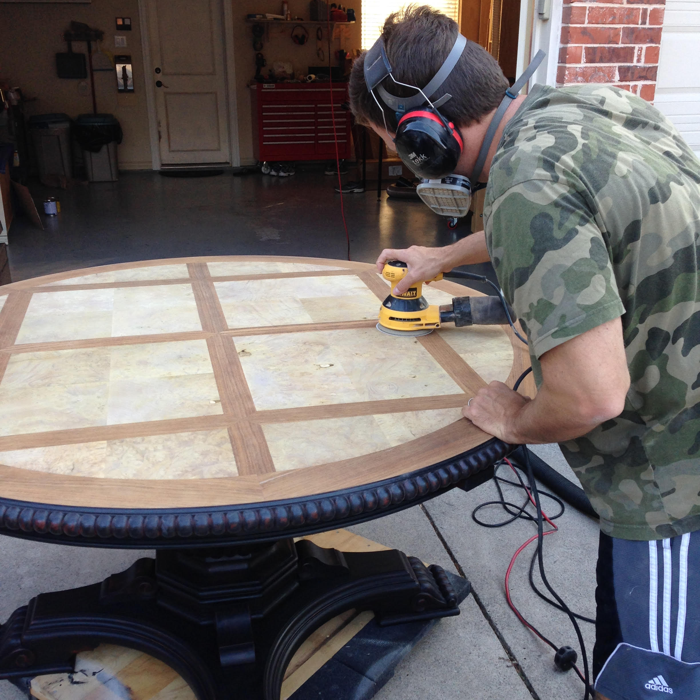 TRIPLE THREAT IN ACTION WITH THE ORBITAL SANDER