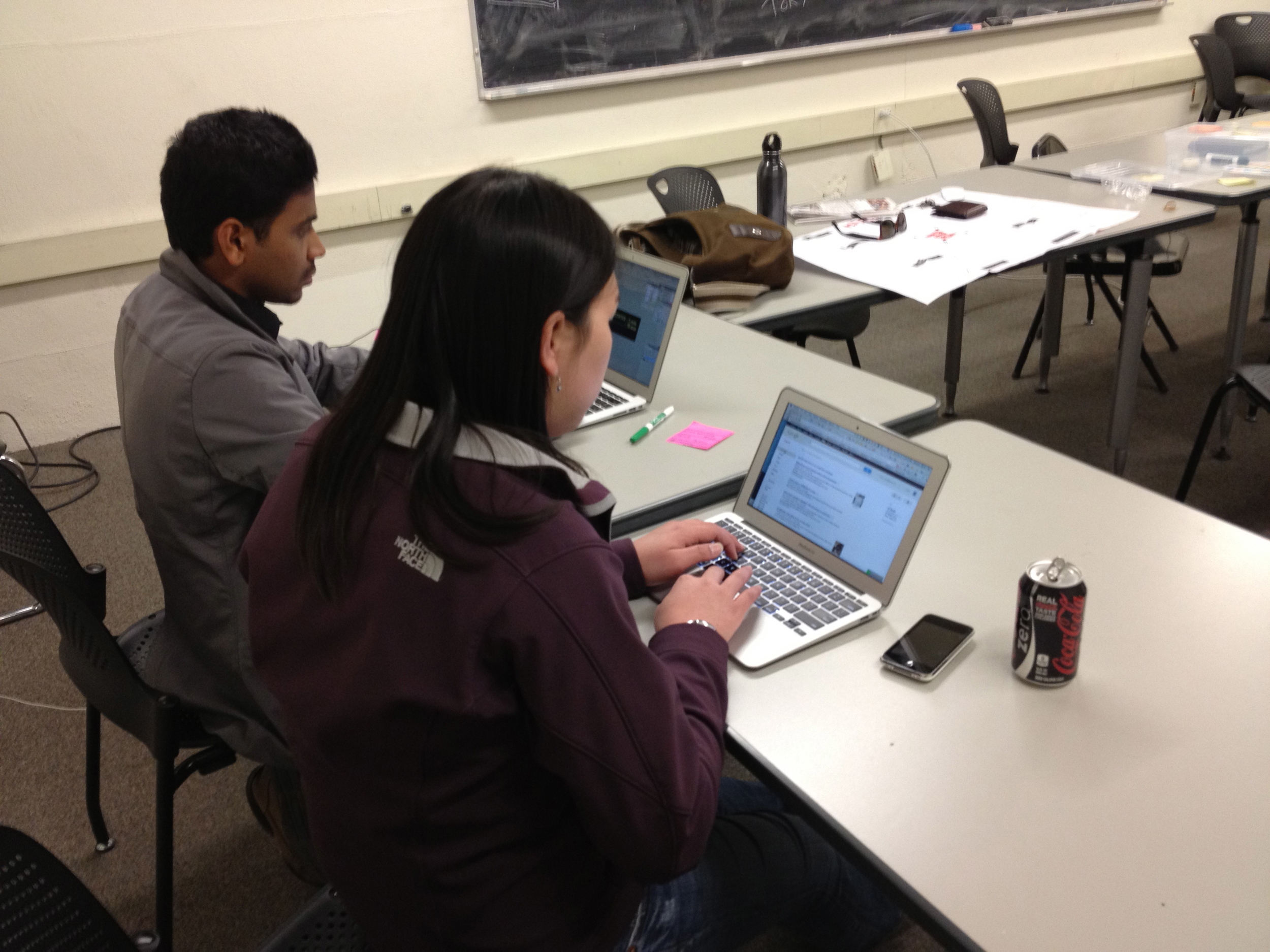 Lauren & Deepak hacking away