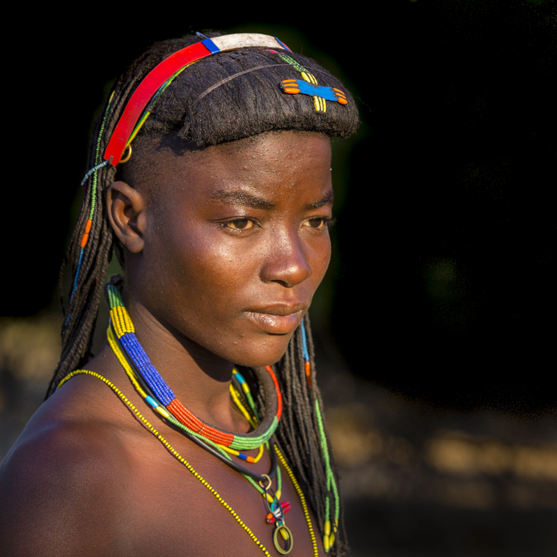 This is Fernanda, a beautiful girl in traditional dress from the Mucawana tribe in Southern Angola. She was the only person we came across who could speak a few words of english, and she was hungry to learn more, to read and to write. This will not happen unless she leaves her tribe for a town where she will quickly become westernised and probably lose her traditions and contact with her family.