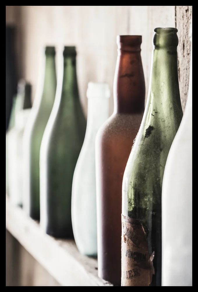 A lot of drinking was done when not working... and empty bottles used for decor in the buildings.
