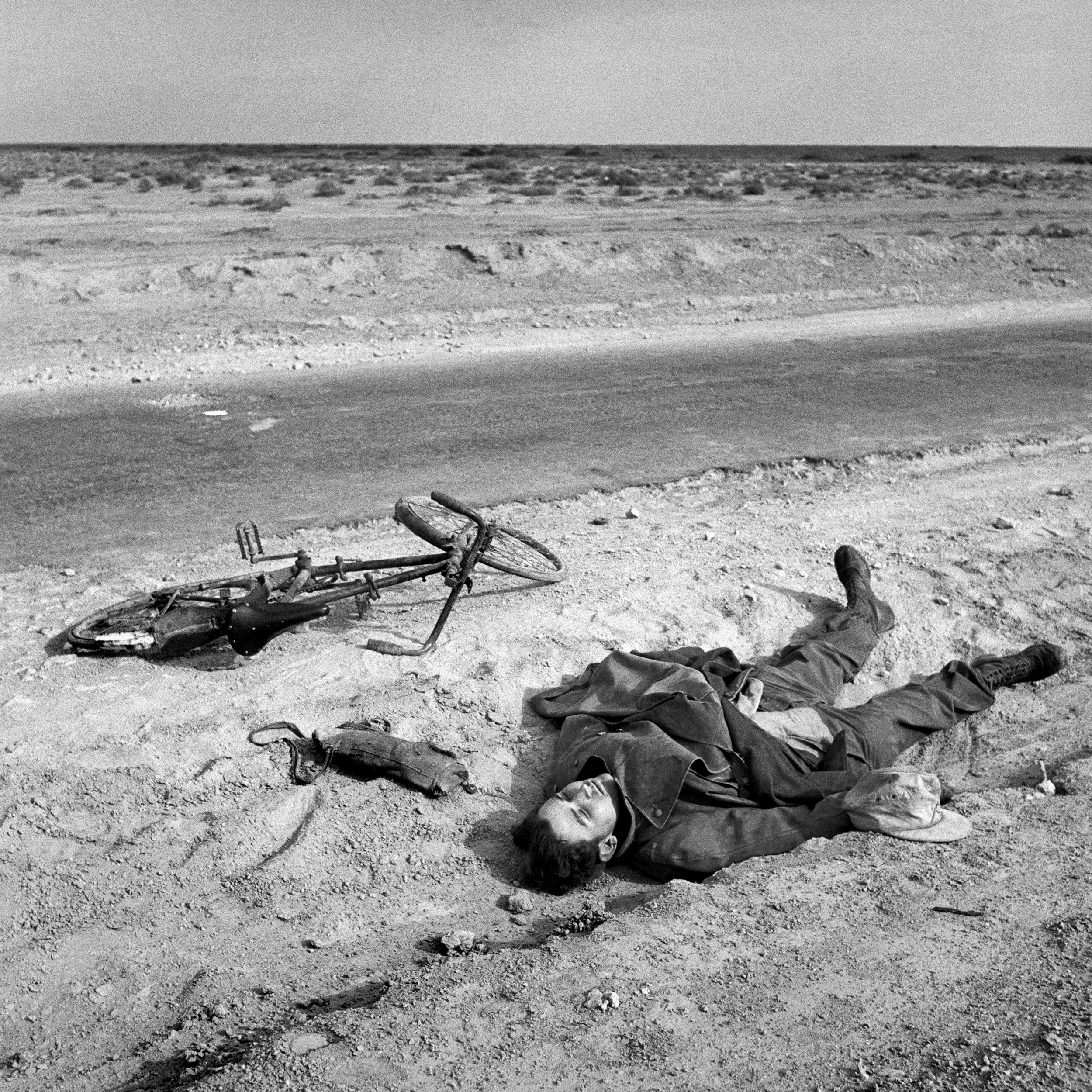A young German soldier lies dead beside his bicycle, Western Desert 1941