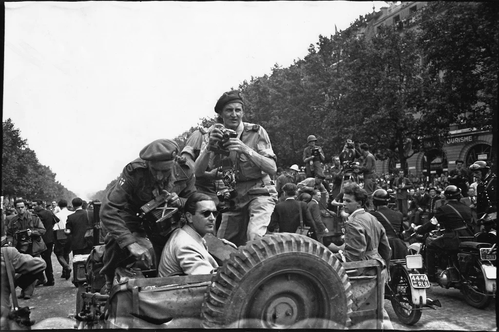 George Rodger photographed by Henri Cartier-Bresson during the liberation of Paris, 1944 © Henri Cartier-Bresson