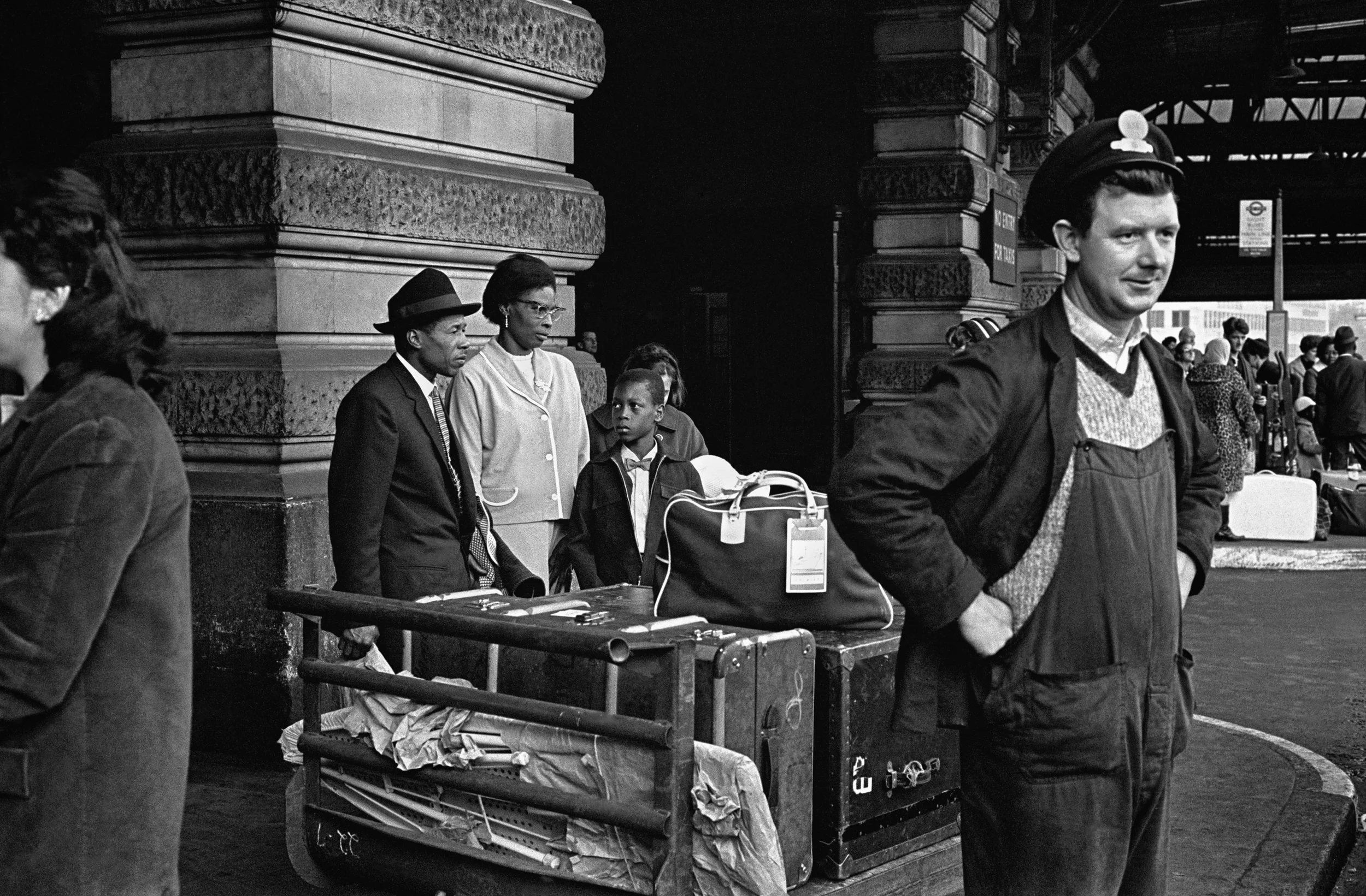 Immigrants arrive at Waterloo Station, London 1963