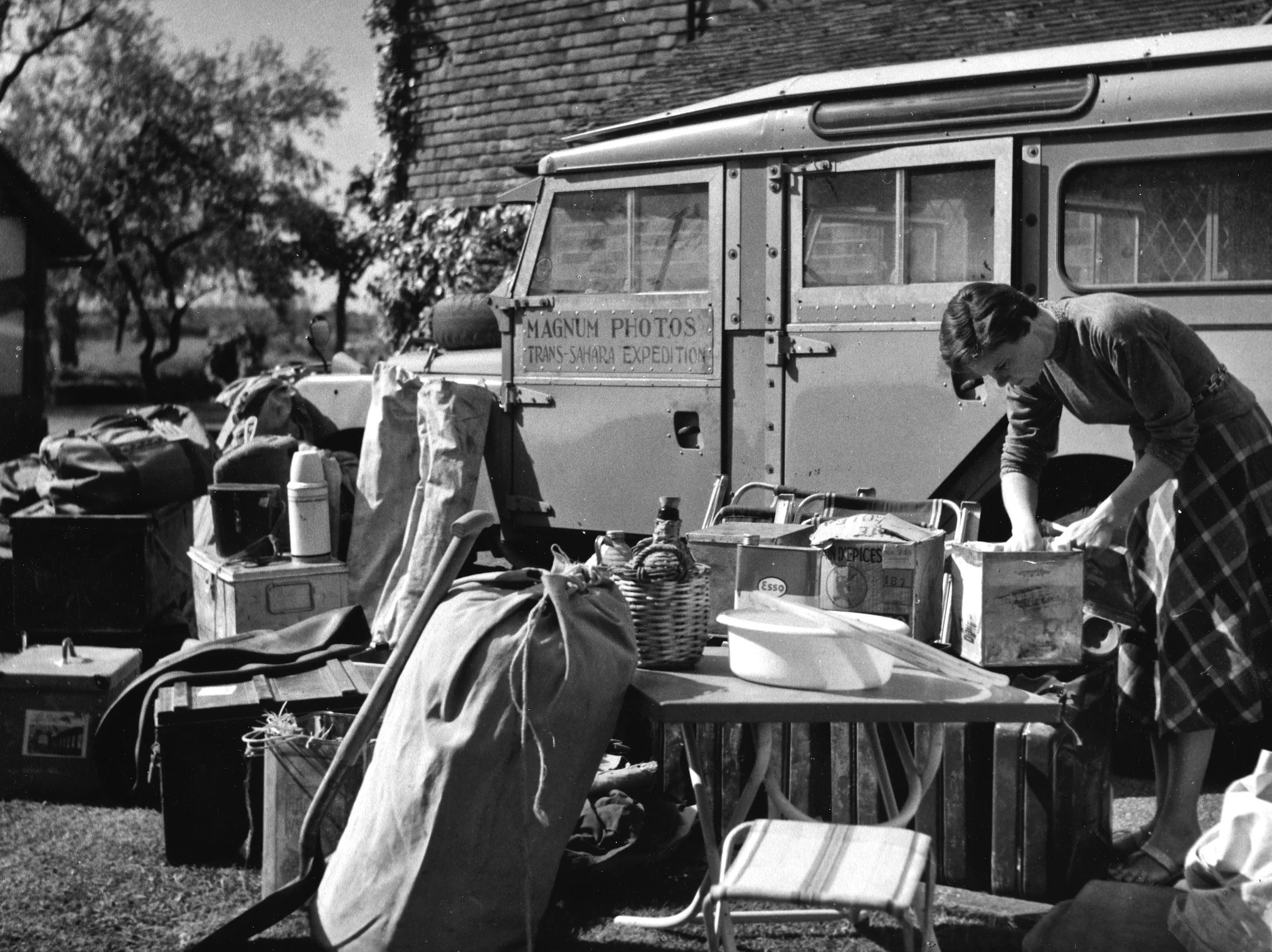 Jinx Rodger preparing the Land Rover for the Trans-Sahara Expedition, Kent, UK 1957