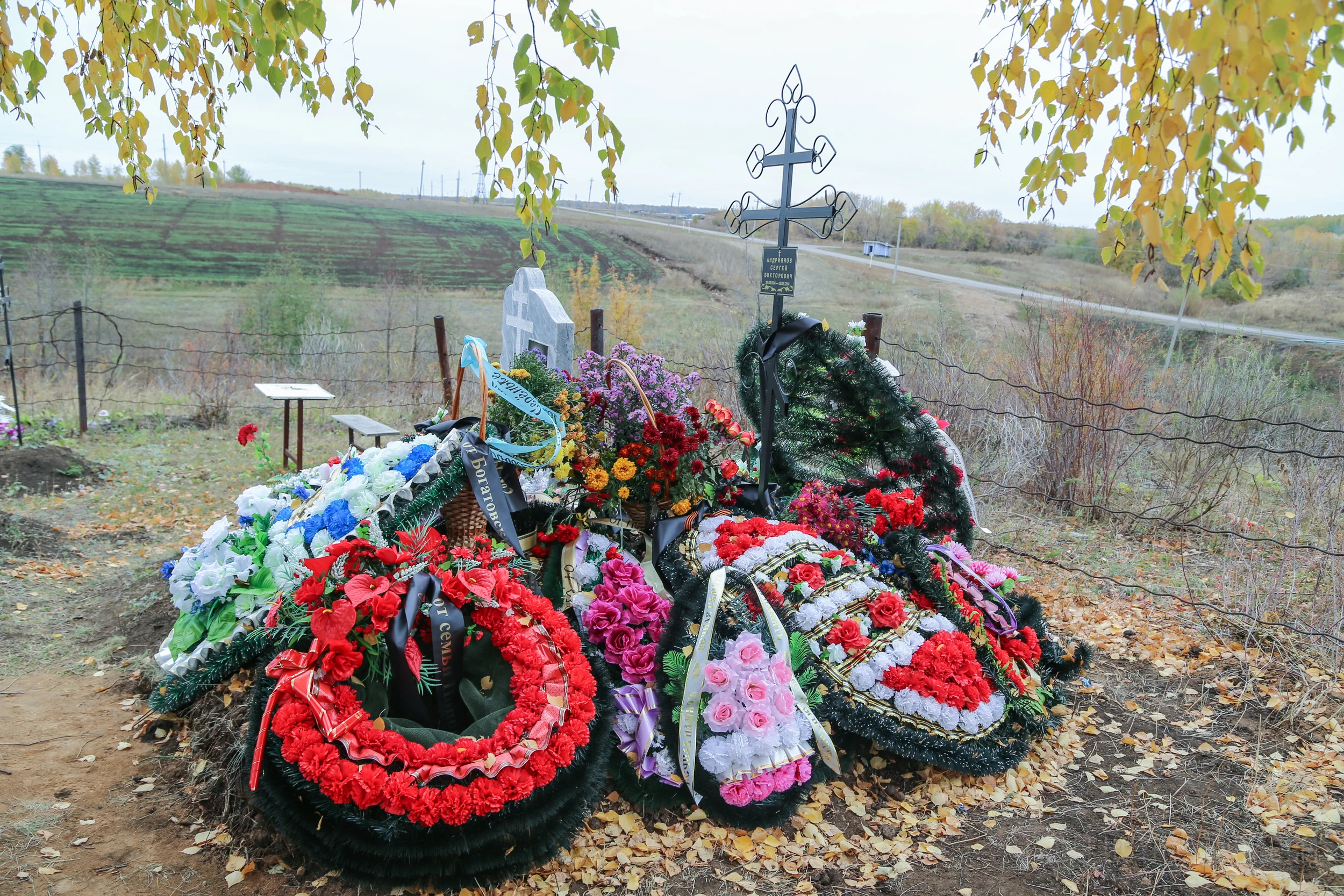 The grave of Sergei, a 20-year-old paratrooper believed to have been killed in action in Ukraine.