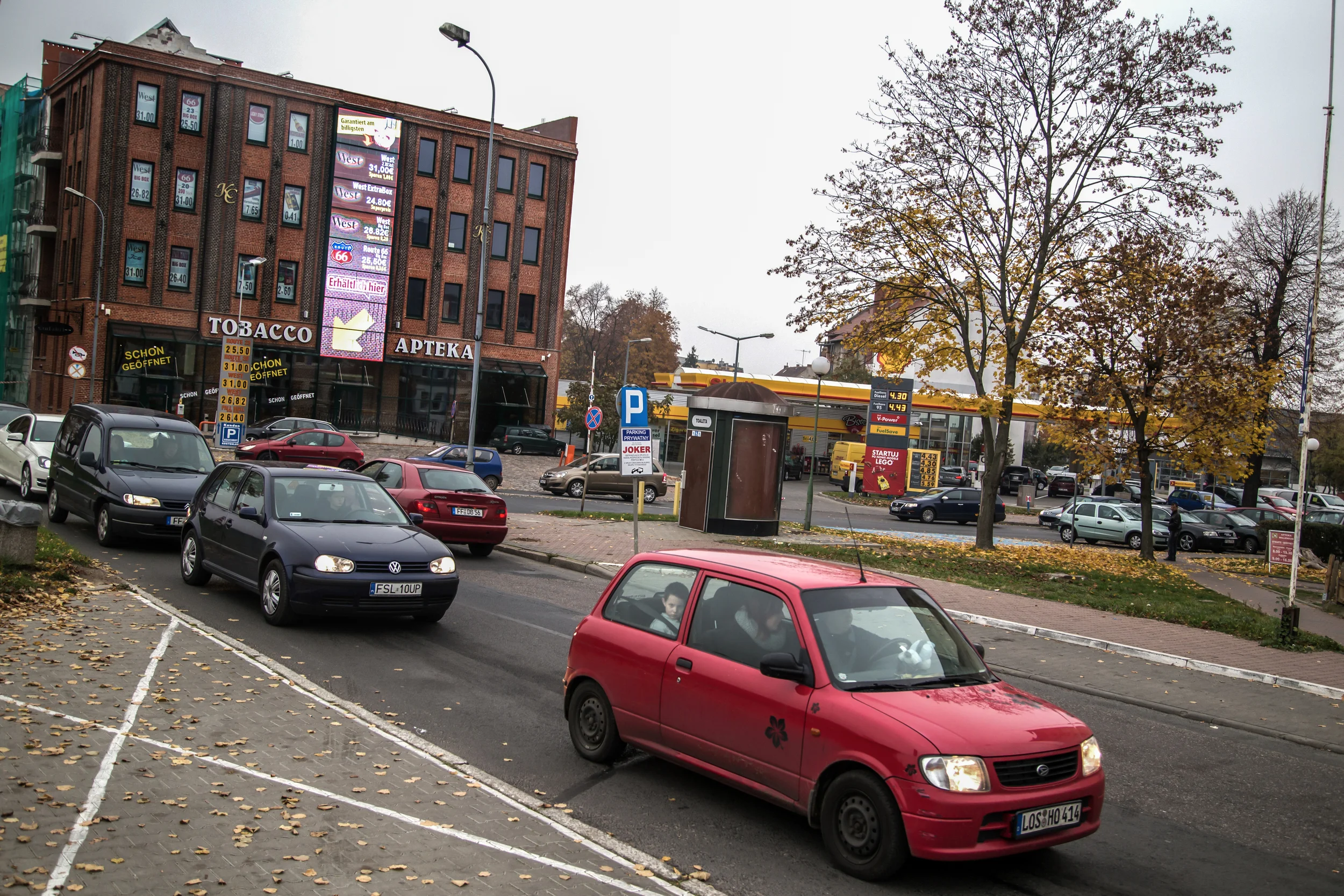 Cars with German and Polish license plates wait in Slubice traffic to cross the Oder bridge to Frankfurt. Many come to Poland to stock up on cheap cigarettes and discount fuel.