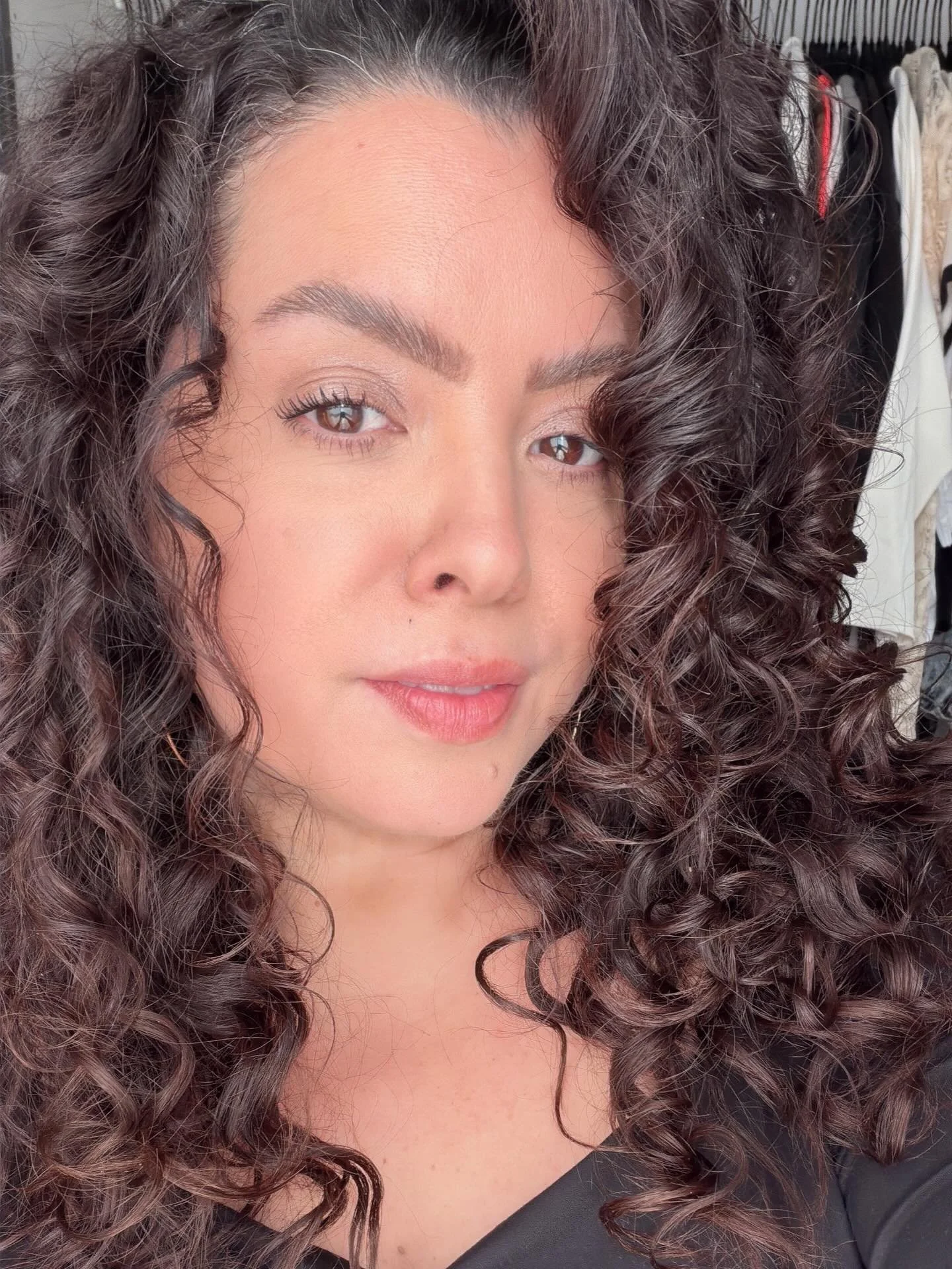 Embracing my natural hair not only means growing out my silver strands but it also means sometimes wearing it curly.  I got some amazing products from Walgreens and started my curly hair routine journey. Loving my late 40s 🖤🖤🖤