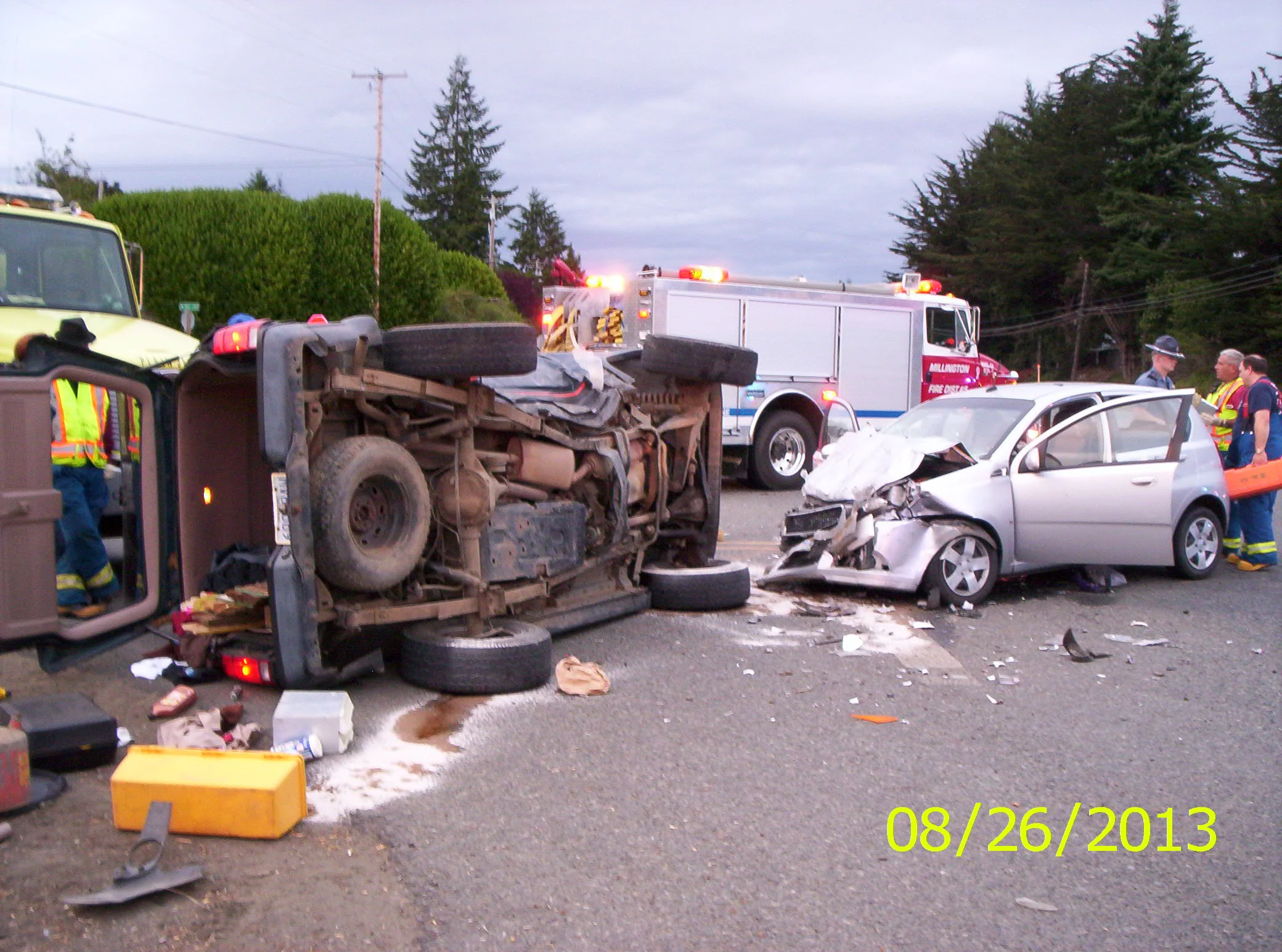 ROLLOVER TRUCK  ALMOST  HITS  ENGINE #53 AS IT WAITS TO ENTER HWY 101