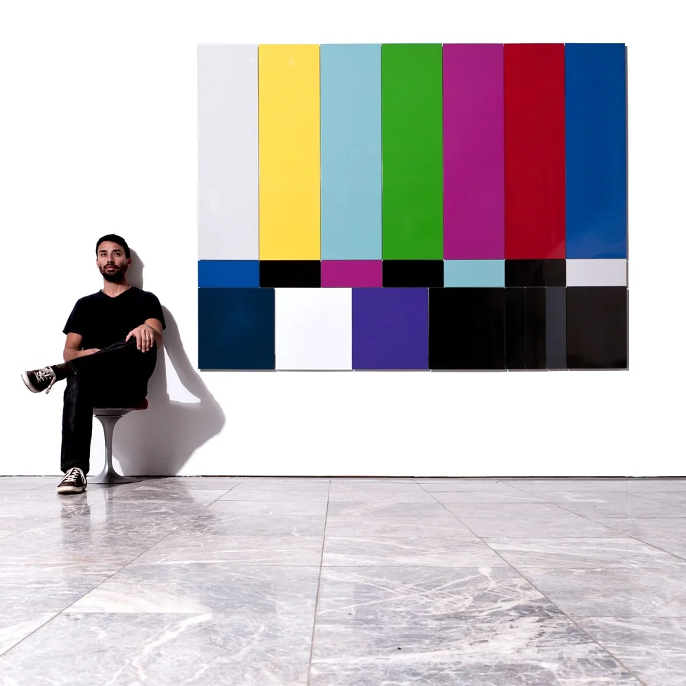 Kristofer Lamey next to his SMPTE color bars during his 2010 Museum of Design Atlanta (MODA) exhibit.