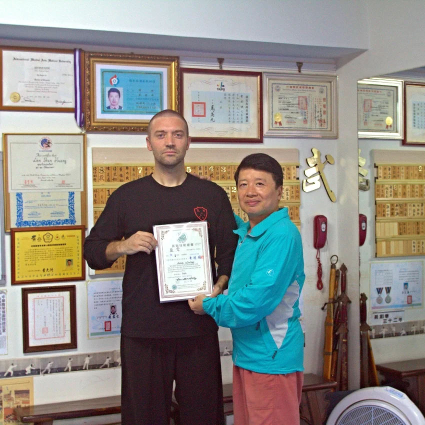 woolsey receives his 5th degree black certificate from Huang