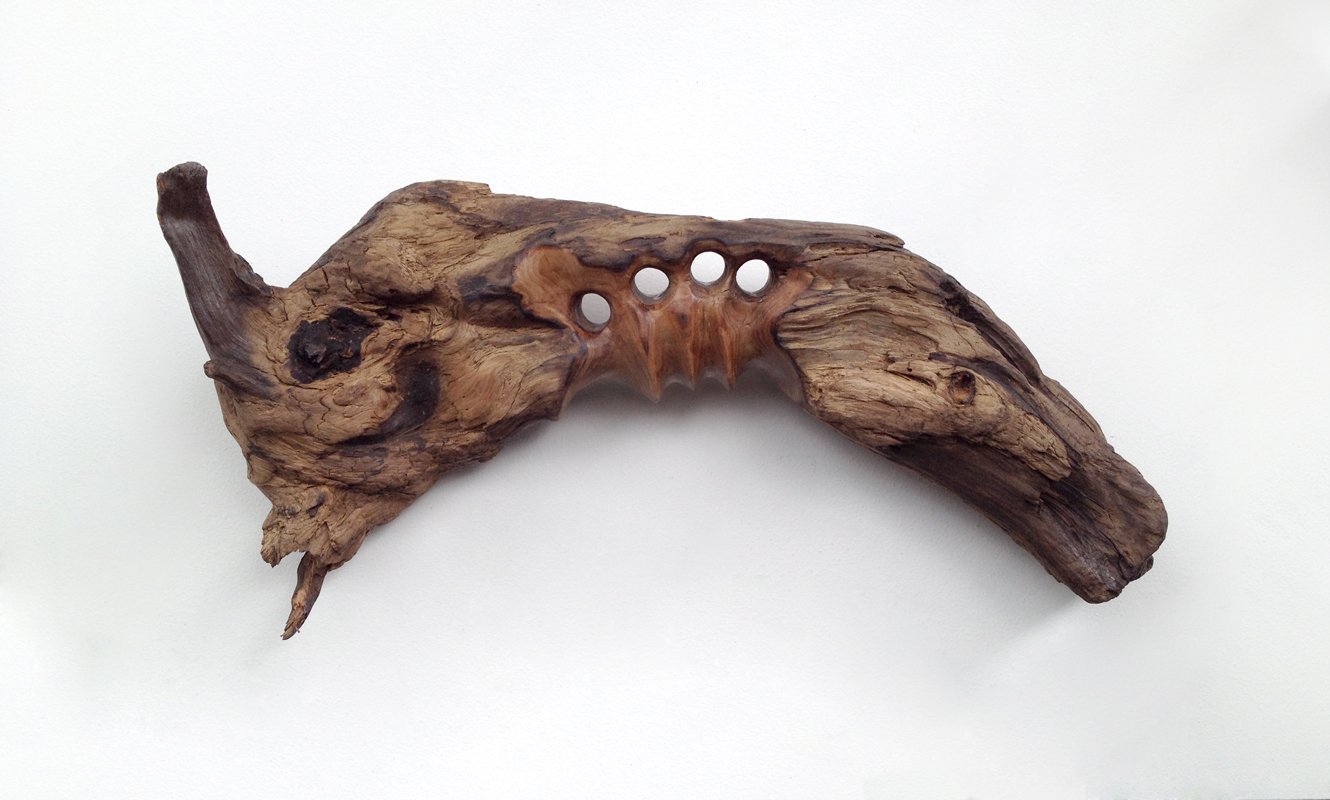 Untitled (Driftwood with Finger Holes) , 2013 hand-carved driftwood treated with polyurethane 8 x 14 x 3.25 inches