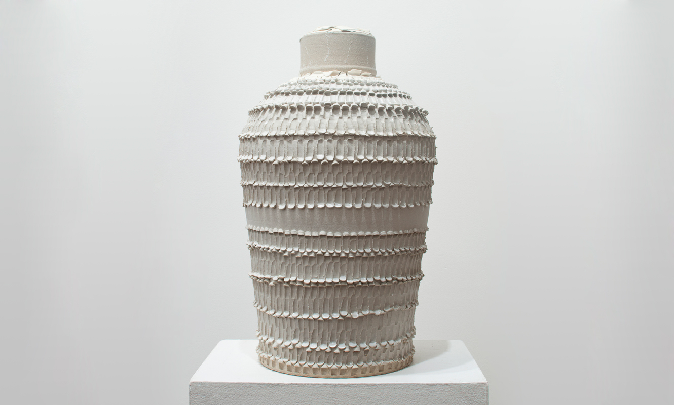 A Sooner Urn , 2013 glazed ceramic, immolated family heirloom 24 x 14 x 14 inches