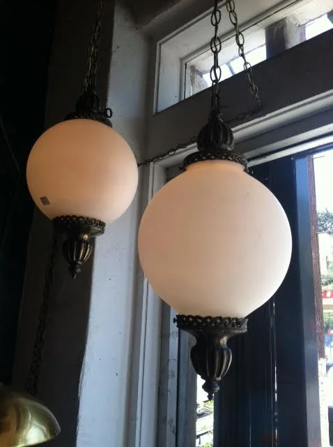 Inner Shakespeare | White Globe Swag Light W/ Antique Brass Finish