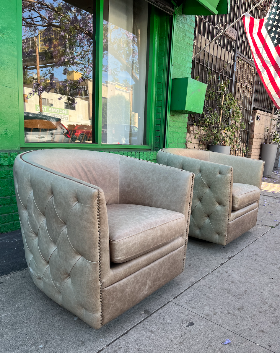 Stress Free | Pair of Distressed Leather Club Chairs Swivel and Glide