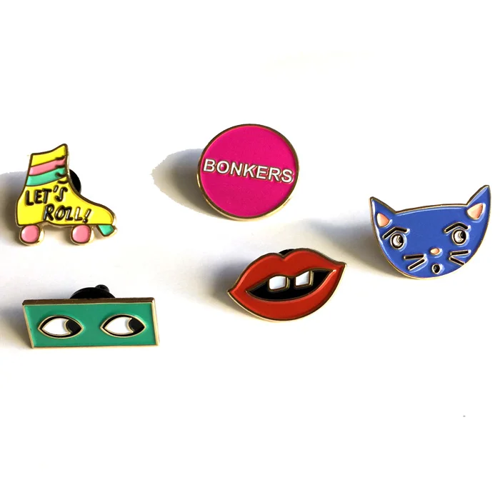 enamel pins by tammie bennett