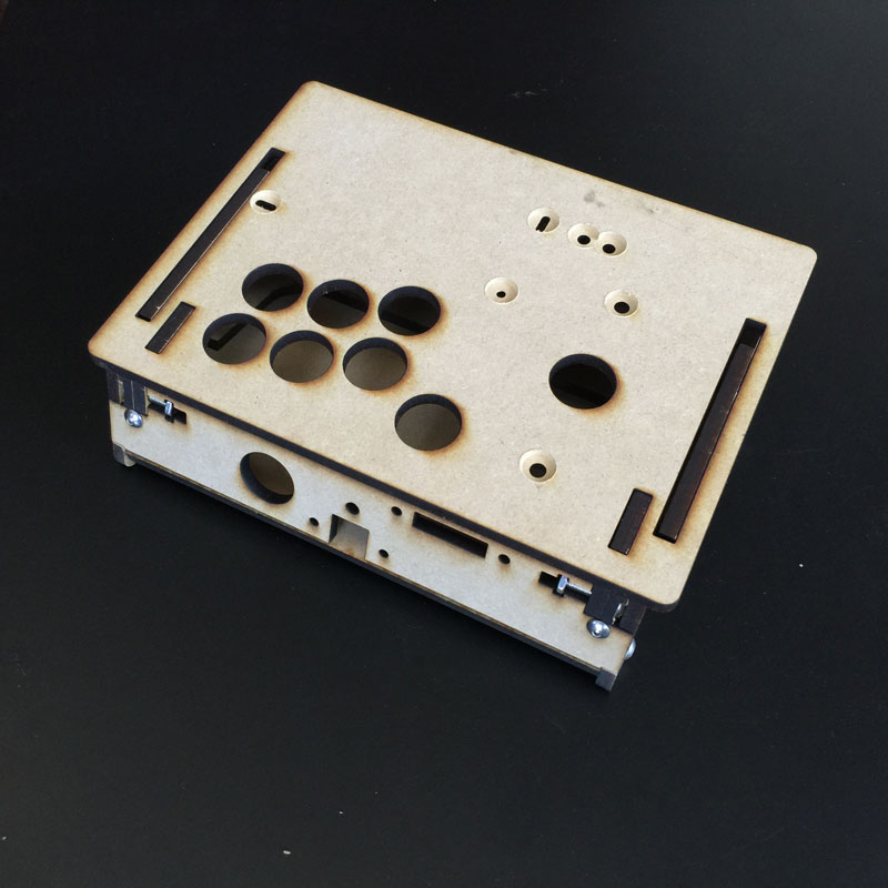  The back panel hosts the programming button and switch for easily loading and saving button presets.&nbsp;We can custom design frame with any inputs for you here:&nbsp; GameThing Shop  