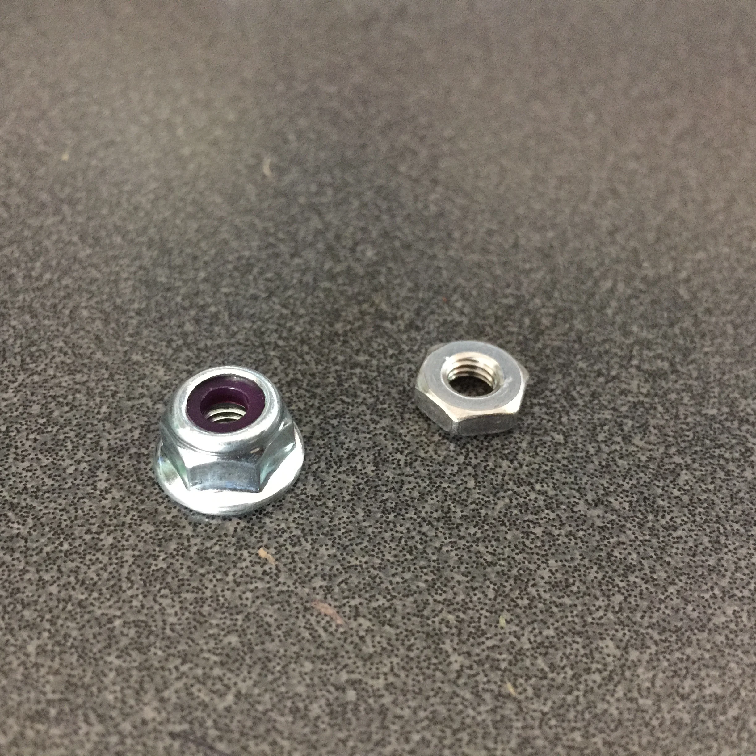 Nyloc nut on the left resists loosening from vibration better than the regular nut on the right