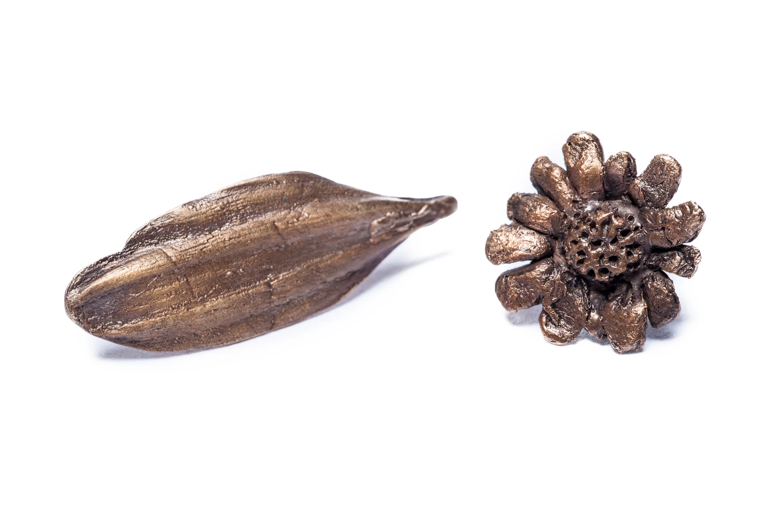 "she loves me, she loves me not," (earrings part of the set)