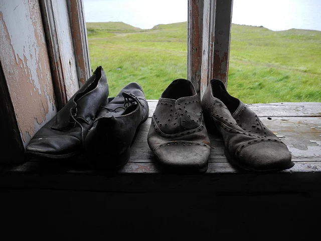 These shoes certainly didn’t spend any time shuffling underneath a computer screen; photo from a derelict farmhouse in Iceland, by Tanja Geis
