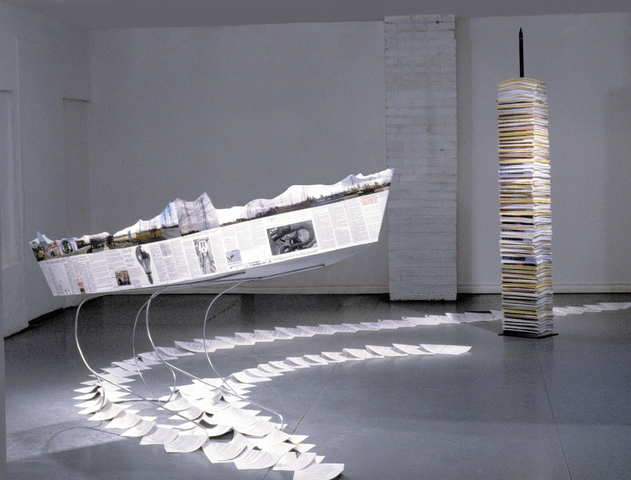 Ship of State , 2004 Wood, paper, steel spike. Steel spike 210 cm, boat on steel stand: 90 x 210 x 90 cm