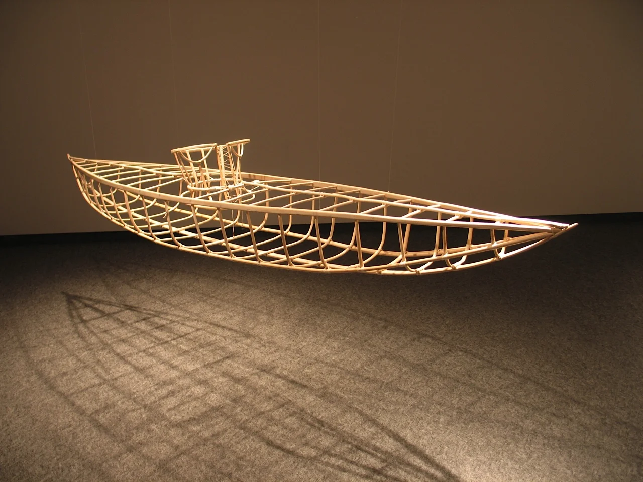 Corset-Kayak , 2000 Driftwood cedar, bent willow spring shoots, linen strings, 127.5 x 305 x 52.5 cm (installed)