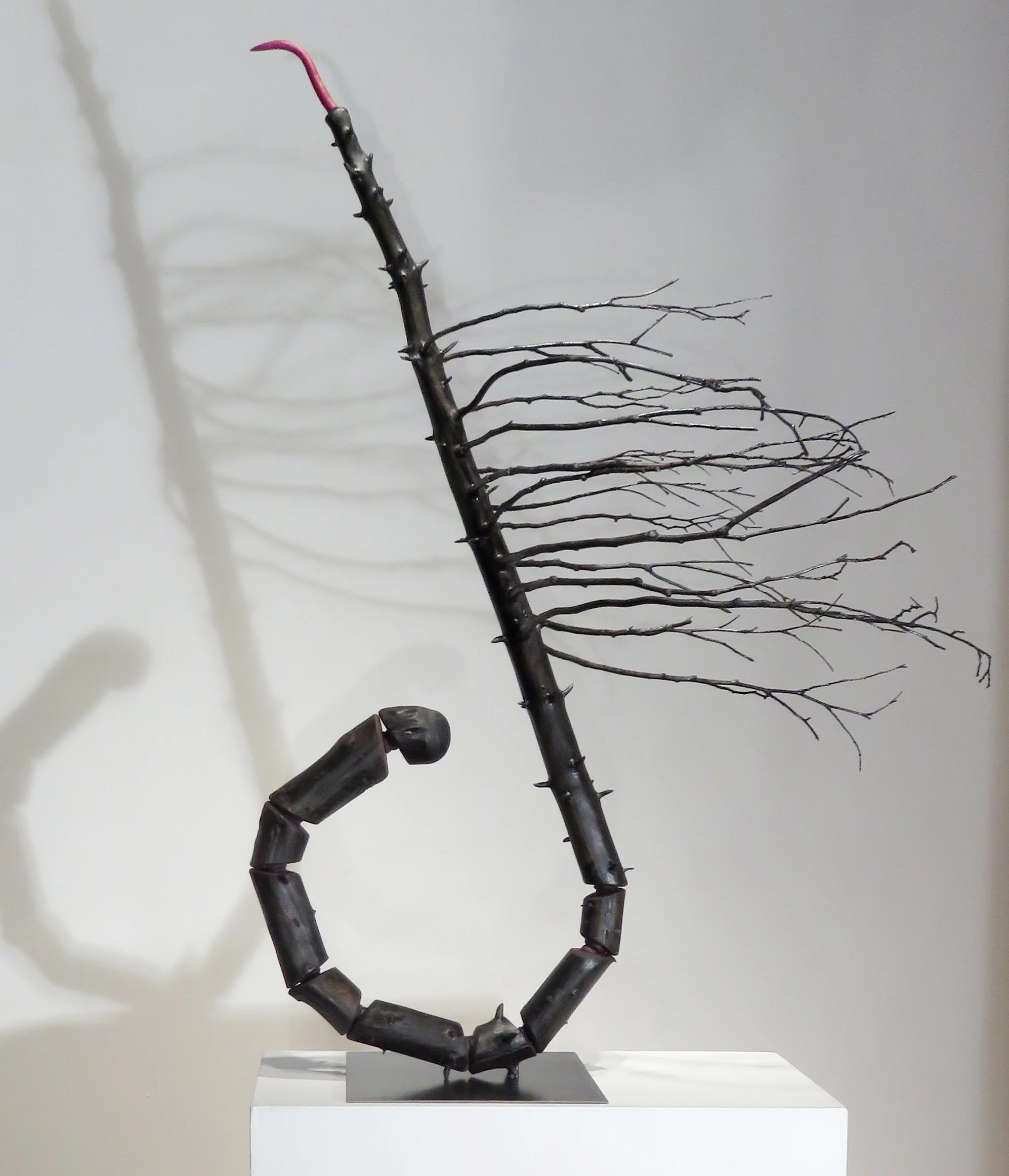 Expectations II , 2016, spruce tree, cedar branches, foam, acrylic paint, steel base, 50 x 38 x 28 inches
