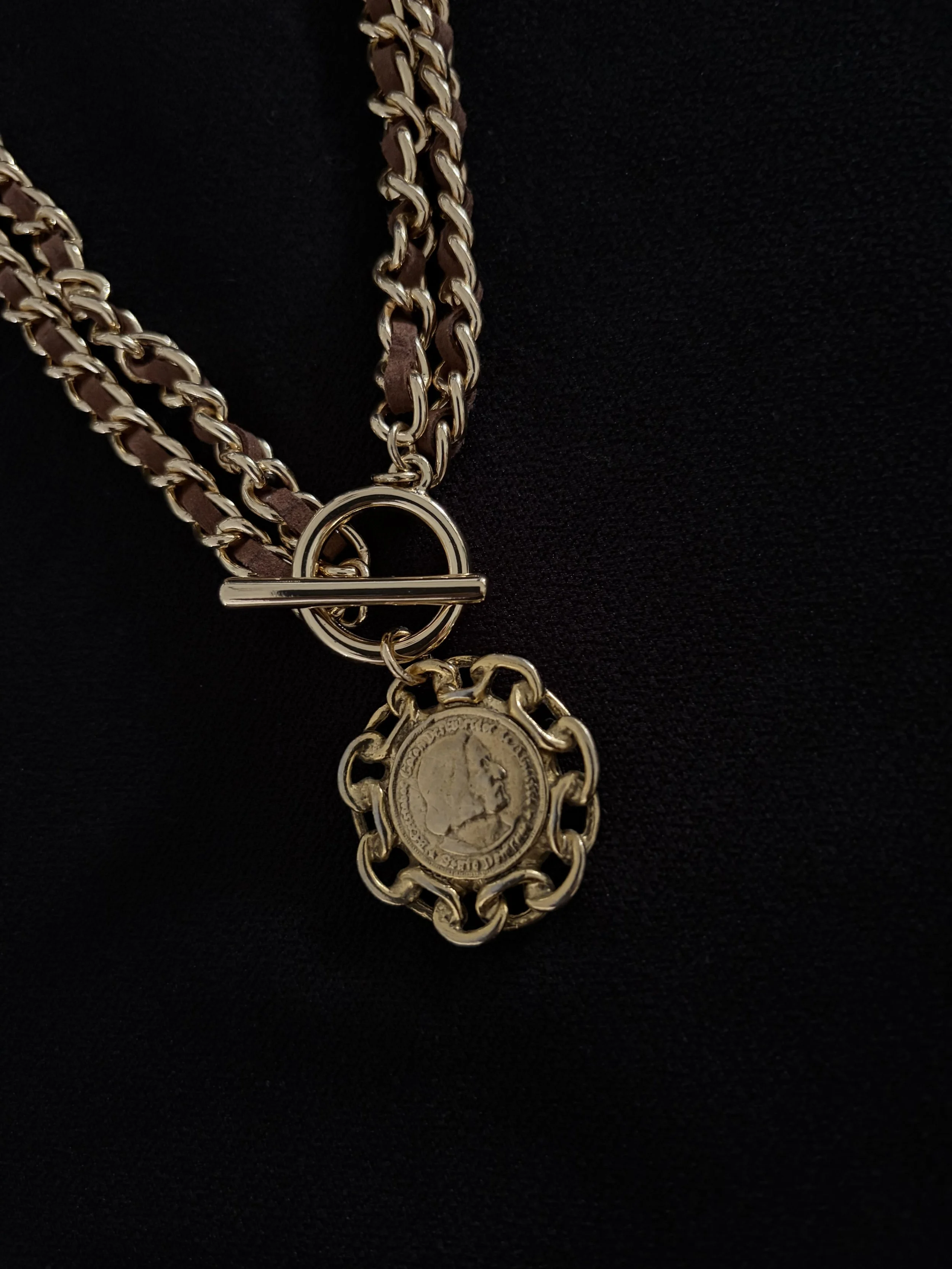 brownandgoldchain on blk 2.jpeg