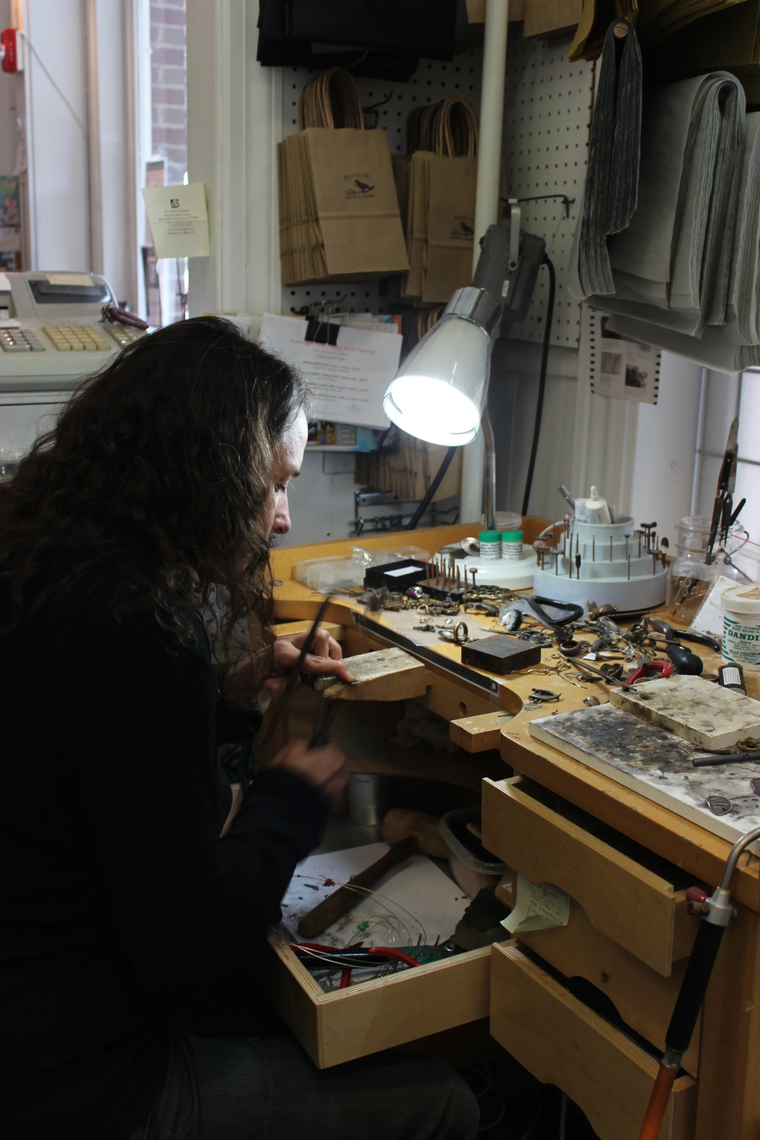 The Master sizing my beautiful stag scarab ring. The ring is from her Coleoptera Collection.