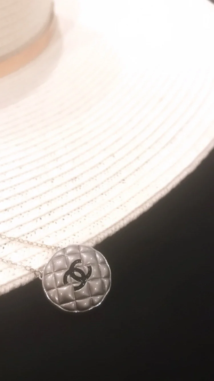 silver quilted chanel.jpeg