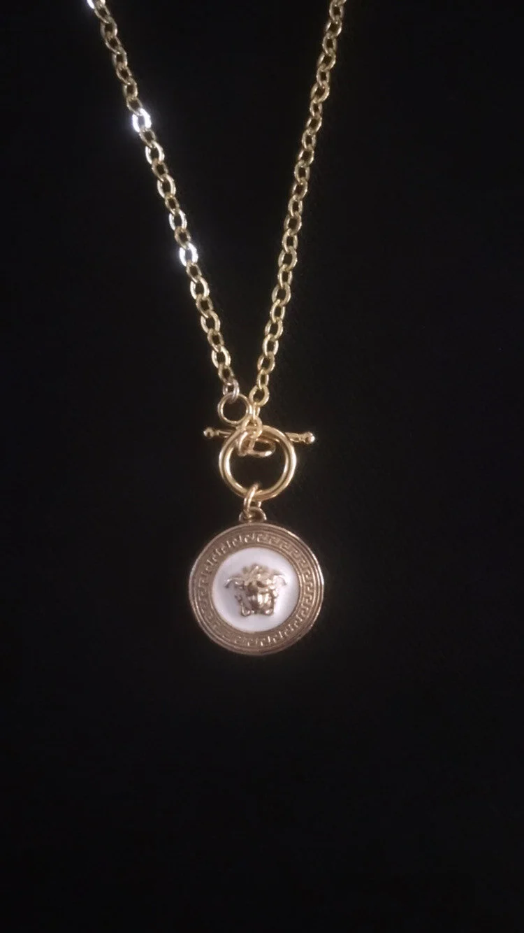 white versace toggle on blk.jpeg