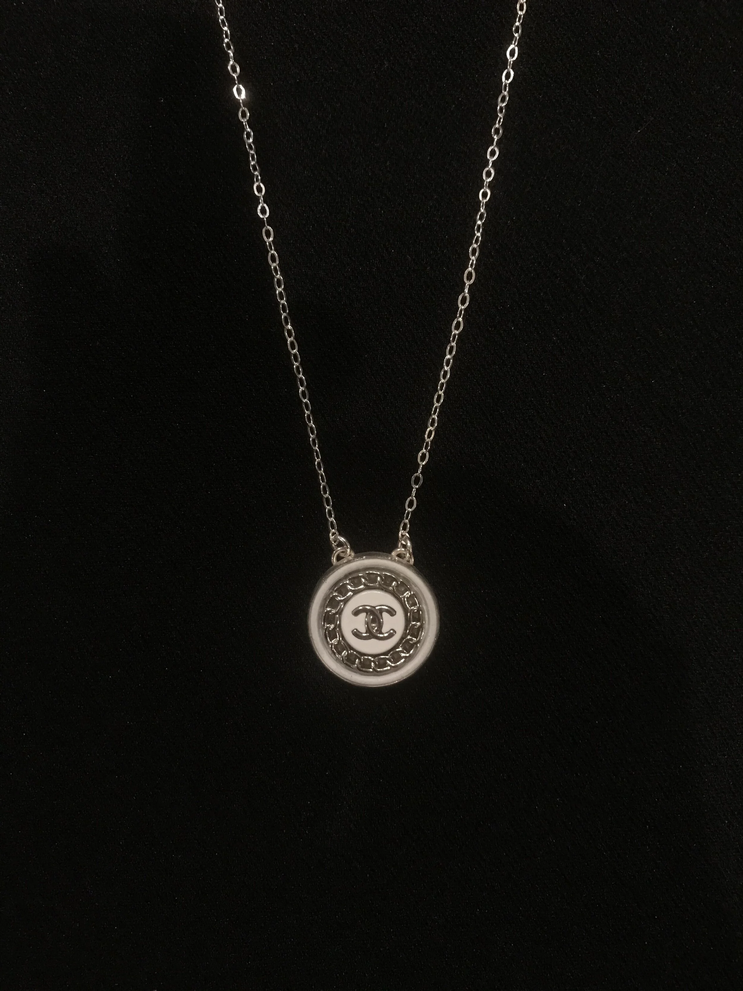 small silver chain on blk.jpeg