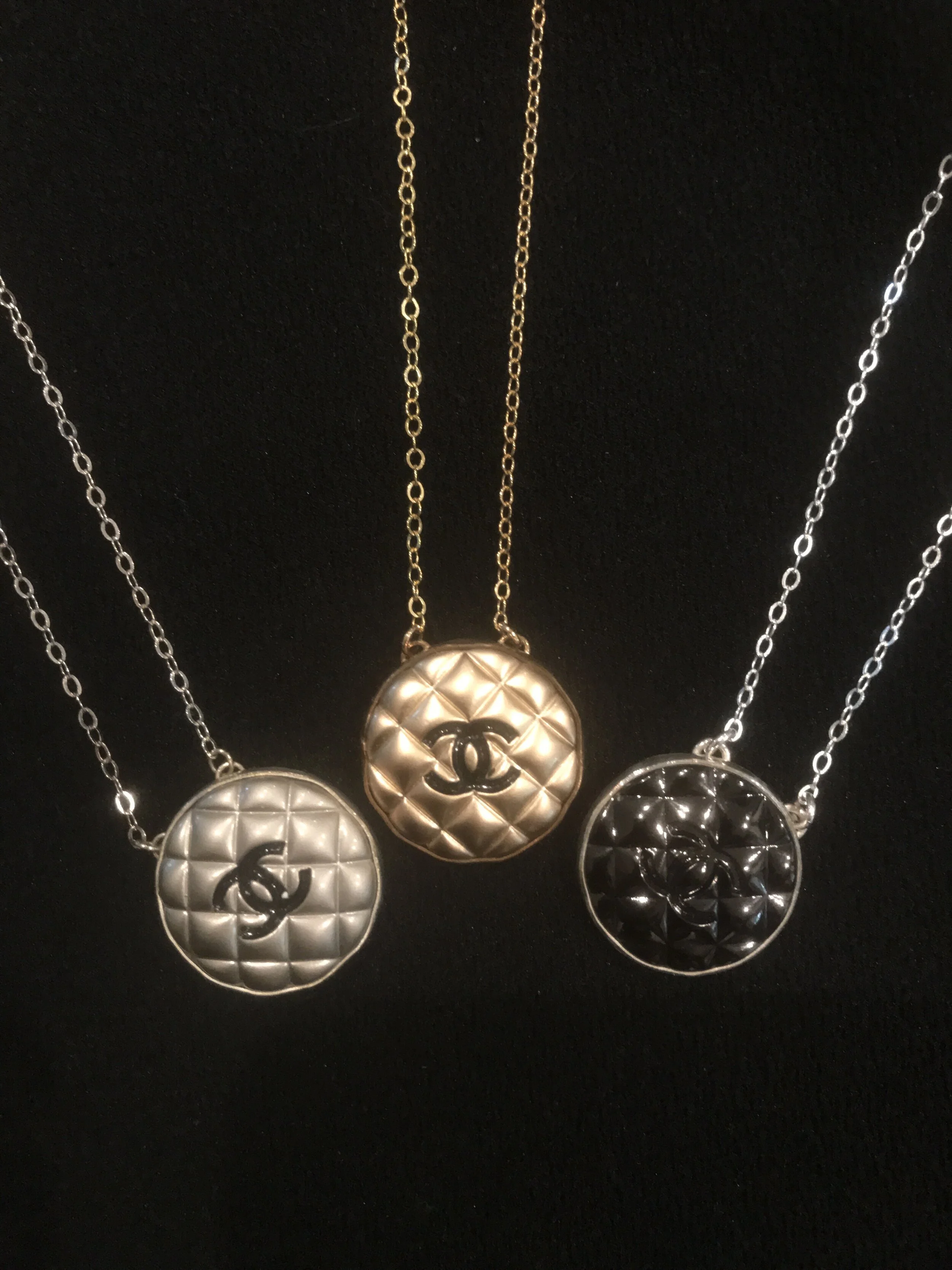 quilted chanel group on blk.jpeg