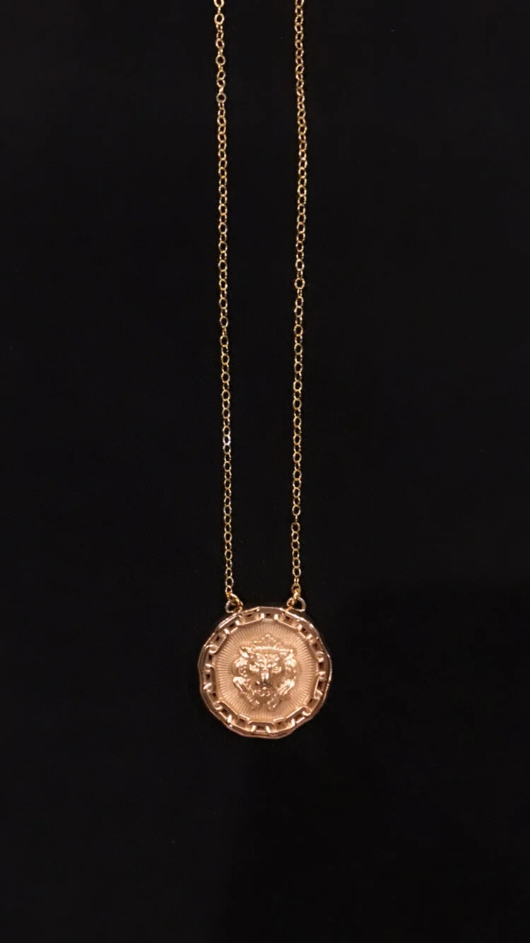 lion with chain on blk.JPG